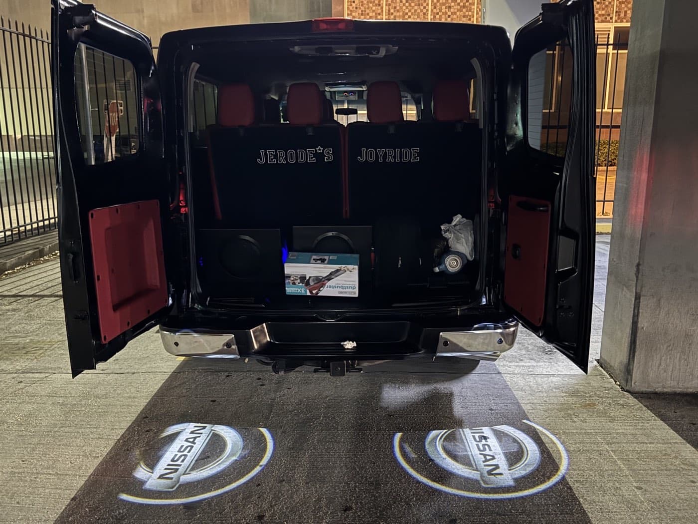 Open rear doors and passenger cabin of the Joy Ride van