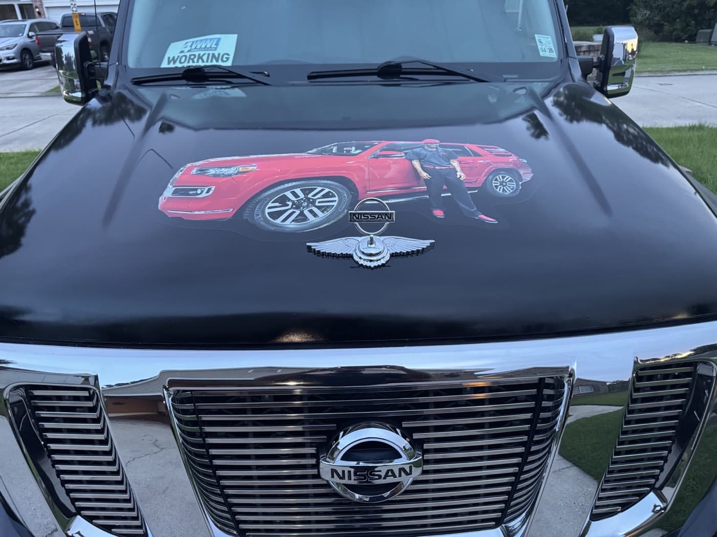 Custom Joy Ride graphic on the hood of the passenger van