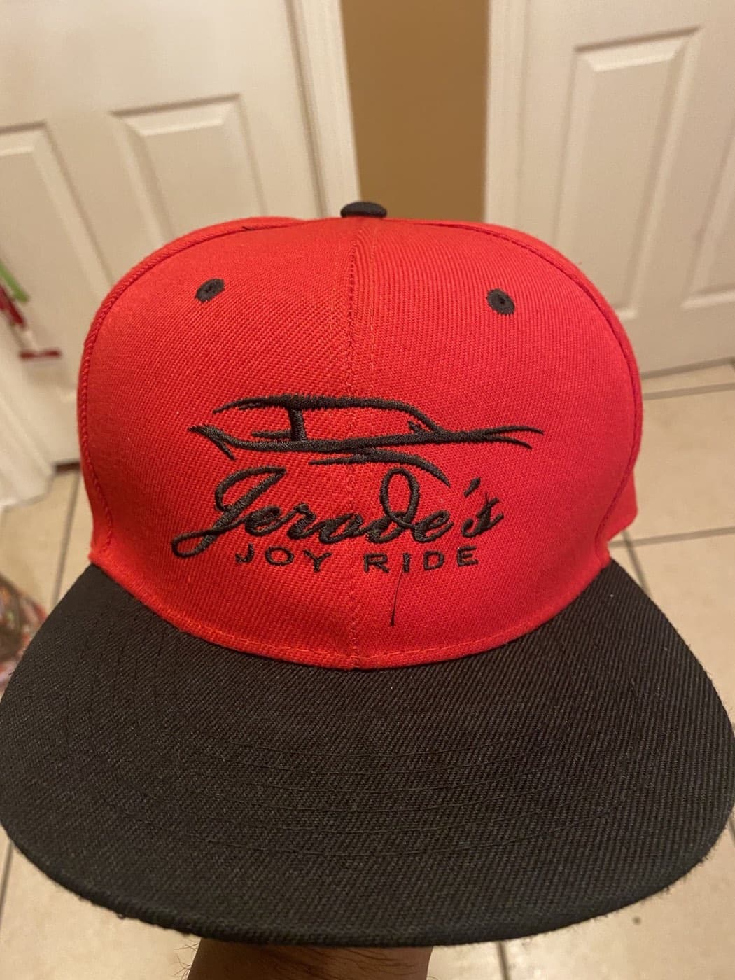 Close view of the embroidered Jerode's Joy Ride cap